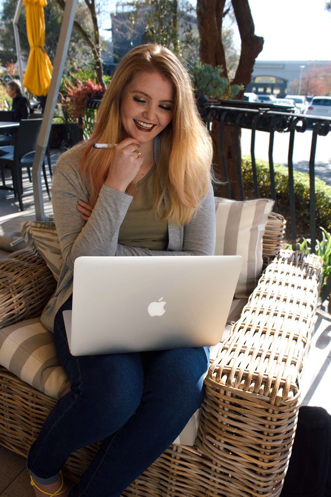 Sumarie Engelbrecht in an online counselling session on her laptop